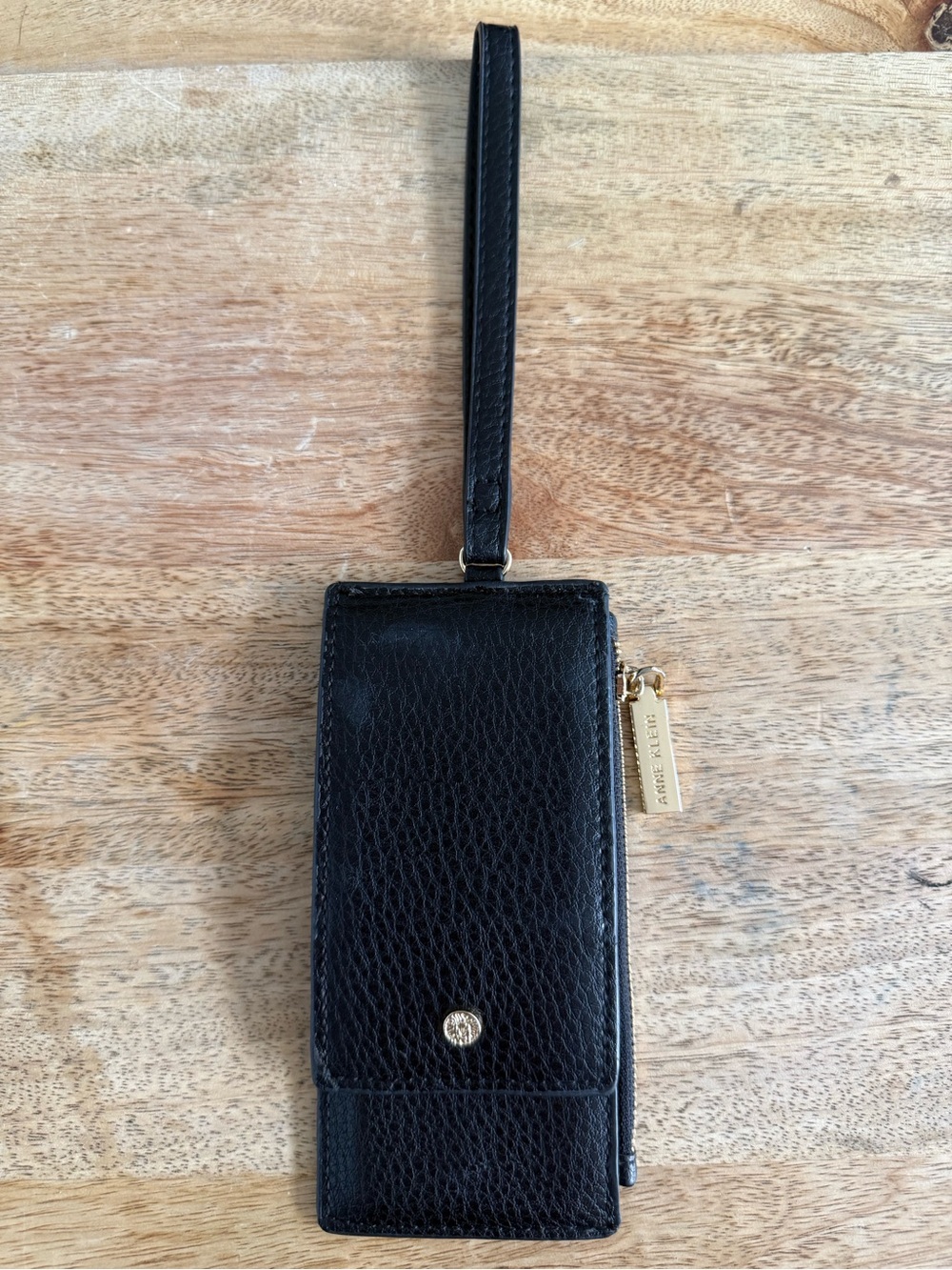 Anne Klein Black Pebbled Leather Wristlet Phone Case with Gold Hardware